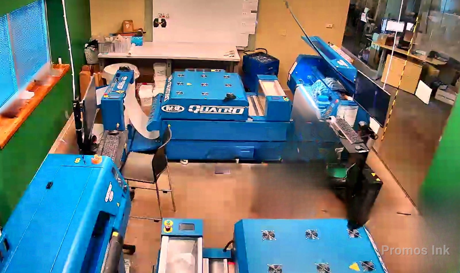 M&R Quatro DTF printers in Promos Ink's direct-to-film production area
